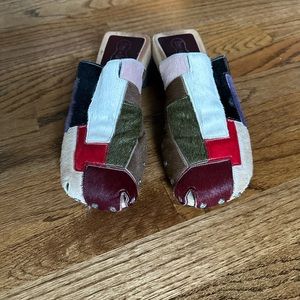 Freelance multi colored patchwork clogs.